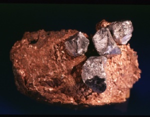 Silver crystals (to 0.6 cm) on copper from the Wolverine Mine, Keweenaw County, Michigan